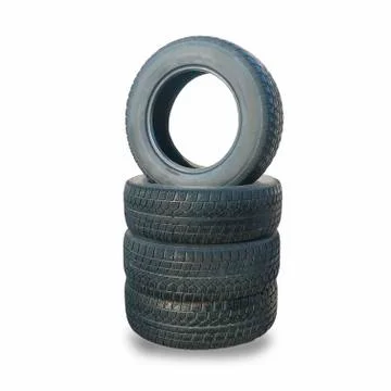 Stack of four wheel new black winter tyres for car Stock Photos