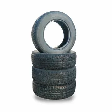 Stack of four wheel new black winter tyres for car Stock Photos