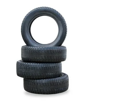 The stack of four winter new tires over white Stock Photos