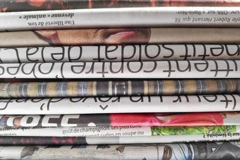 Stack of French newspapers Stock Photos