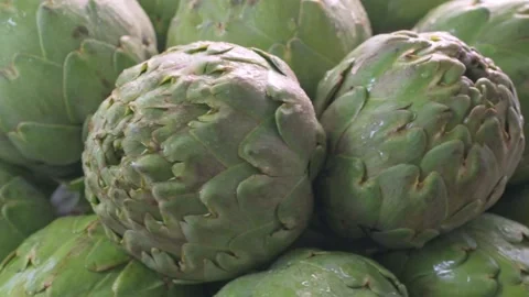 Stack of fresh artichokes ready to cook. Stock Footage 268278765