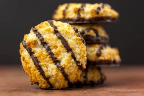 Stack of fresh chocolate dipped coconut macaroons Stock Photos