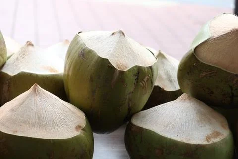 Stack of fresh coconut display for sale Stock Photos