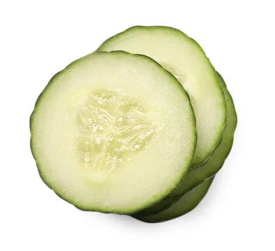 Stack of fresh cut cucumber isolated on white, top view Foto stock