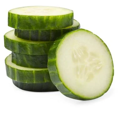 Stack of fresh cut cucumber isolated on white 스톡 사진