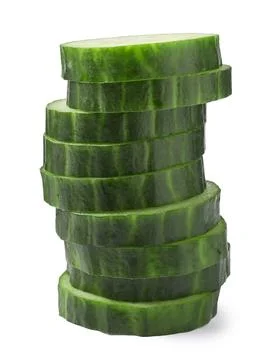 Stack of fresh cut cucumber isolated on white Foto stock