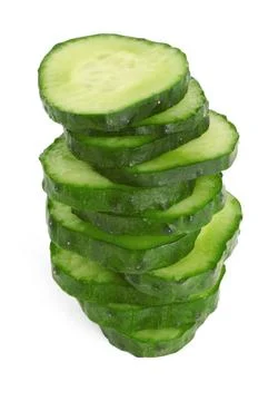 Stack of fresh cut cucumber slices isolated on white Foto stock