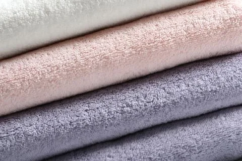 Stack of fresh folded towels as background, closeup 写真素材