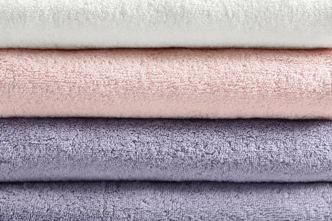 Stack of fresh folded towels as background, closeup 스톡 사진