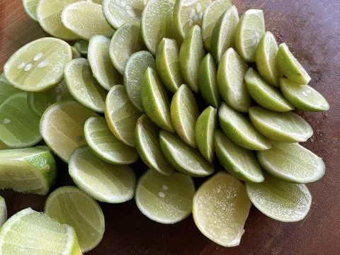 Stack of Fresh Lime Slices in top view. Fresh lime as a cooking flavoring Stock Photos