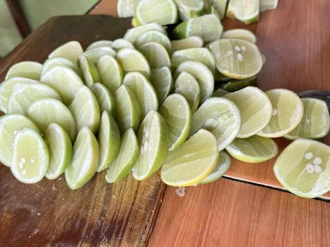 Stack of Fresh Lime Slices in top view. Fresh lime as a cooking flavoring Stock Photos