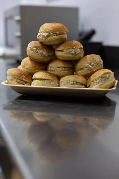 Stack of fresh mini sandwiches arranged on catering tray Stock Photos