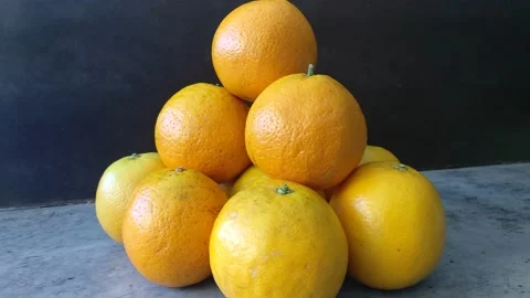 Stack of fresh oranges on the counter Stock Footage 156197468