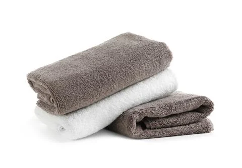Stack of fresh towels isolated on white Foto stock