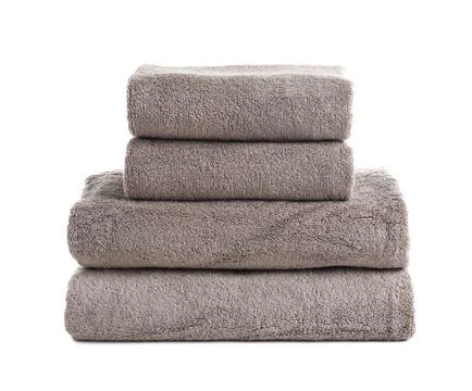 Stack of fresh towels isolated on white Stockfoto's