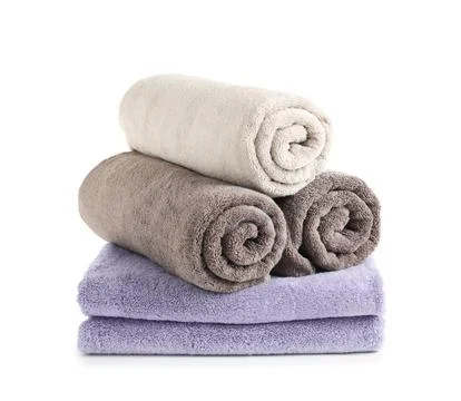 Stack of fresh towels isolated on white Stock Photos