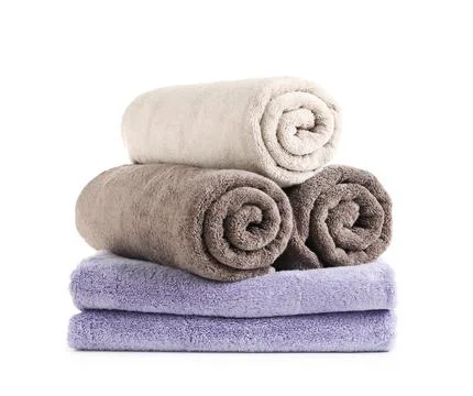 Stack of fresh towels isolated on white Foto stock