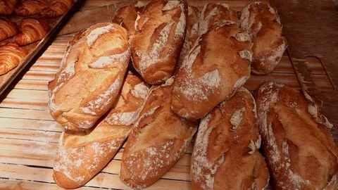 Stack of Freshly Baked Bread in Bakery Stock Footage 104239152