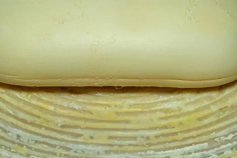 A stack of freshly baked flaky pastry dough layers for culinary use in baki Stock-Fotos