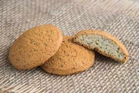 Stack of freshly baked oat biscuits on the background of burlap Stock Photos