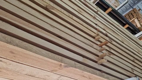 A stack of freshly sawn softwood boards Видео 335485357