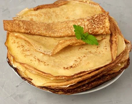 Stack of fried round pancakes on a plate Stockfoto's