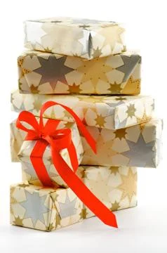 Stack of Gift Boxes and one with Red Bow Stock Photos