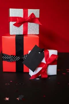 Stack of gift boxes with empty price tag for sales promotions. Copy space Stock Photos