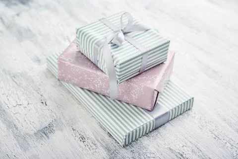 Stack gift boxes with gray ribbon Stock Photos