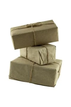 Stack of giftbox in craft paper on a white background festive set Stock Photos