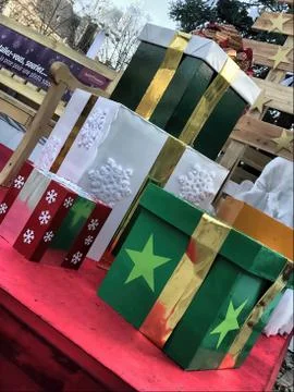 A stack of gifts wrapped and stacked on the street during the christmas holidays Stock Photos