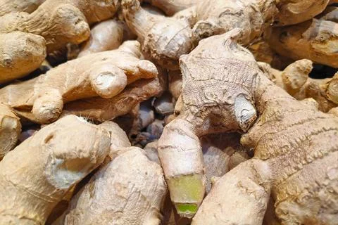Stack of gingers on a market stall Foto stock
