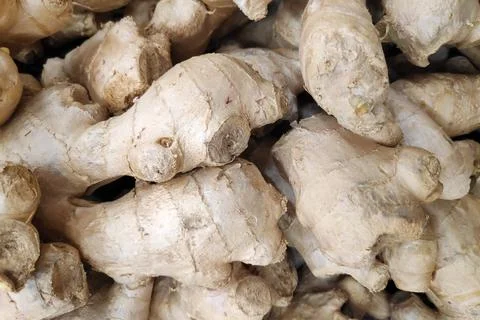 Stack of gingers on a market stall Stock Photos
