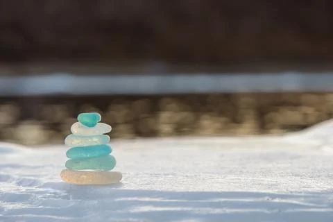 Stack of glass pebble on sunset Stock Photos