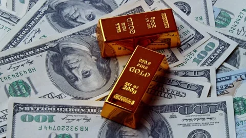 Stack Of Gold Bars On Dollar Bills Background Wealth And Prosperity Stock Footage 326173201