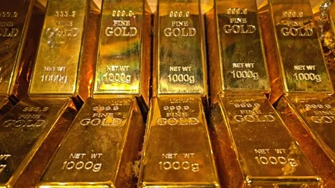 Stack of gold bars with engraved weight arranged in rows. Stock Footage 310851469