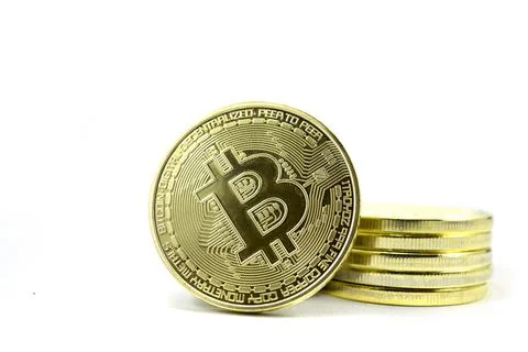 Stack of gold bitcoin coins isolated on a white background Stock Photos