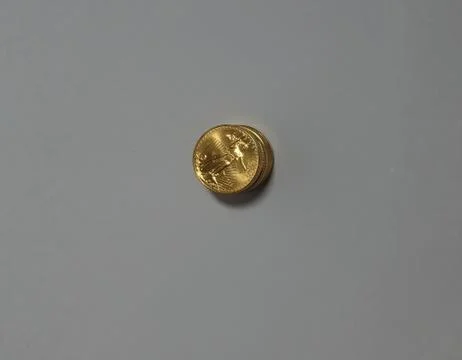 A stack of gold coins. Stock Photos