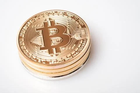 Stack golden bitcoin isolated on white background Stock Photos