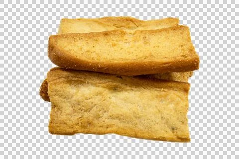 Stack of golden brown toasted bread rusks, rectangular crispy baked slices. Stock Photos
