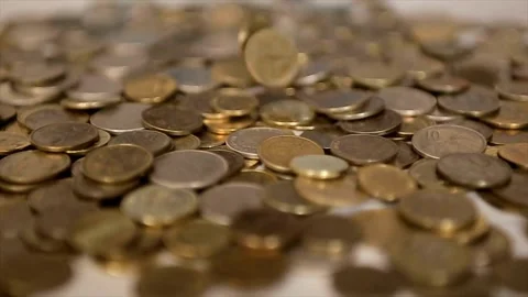 Stack of golden coin on table background and business or finance saving money Video stock 334027856