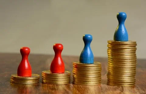 Stack of Golden Coins Graph going up with pawns Stock Photos