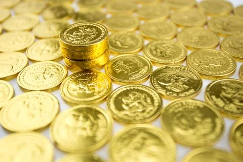 Stack of golden coins isolated Stock Photos