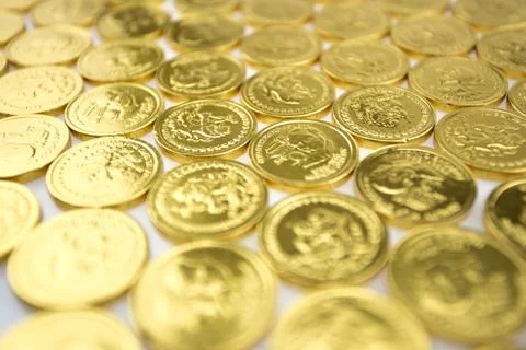 Stack of golden coins isolated Stock Photos