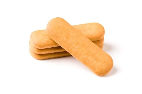 Stack of golden finger shaped biscuits isolated on white background Stock Photos