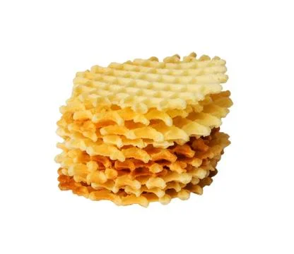 A stack of golden round waffles isolated. Stock Photos