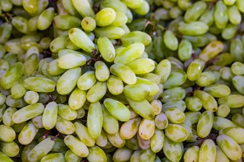 Stack of grapes in retail vegetable super market for sale Stock Photos