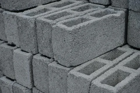 Stack of gray construction bricks Stock Photos