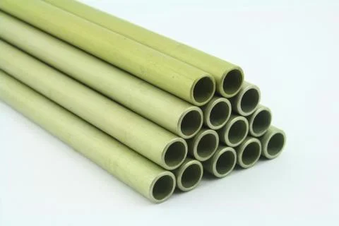 Stack of  green aluminum tubes Stock Photos