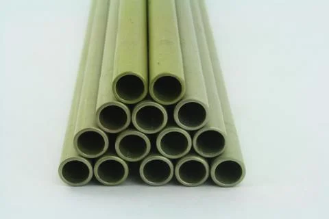 Stack of  green aluminum tubes Stock Photos
